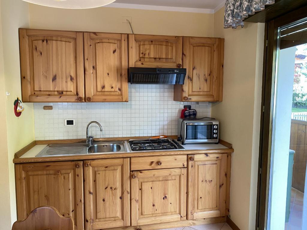 Kuchyň nebo kuchyňský kout v ubytování Condominio Gaiolin