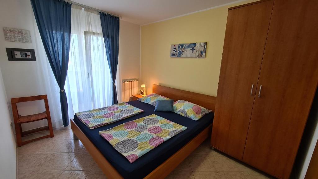 Postel nebo postele na pokoji v ubytování Apartments Aleksandra 1132