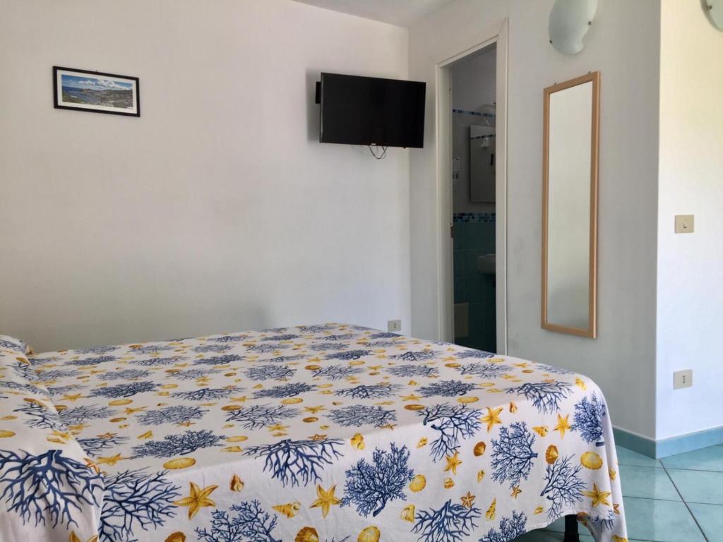 TV a/nebo společenská místnost v ubytování Vento di Terra Ponza