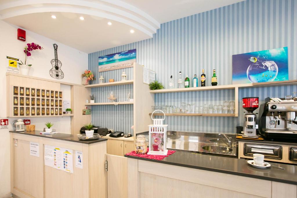 Kuchyň nebo kuchyňský kout v ubytování HOTEL VALPARAISO