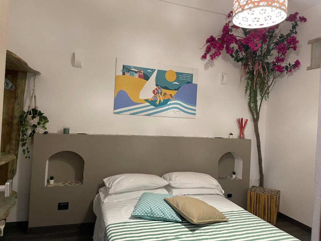 Postel nebo postele na pokoji v ubytování Homiday - Bel Salento Specchia Guest house
