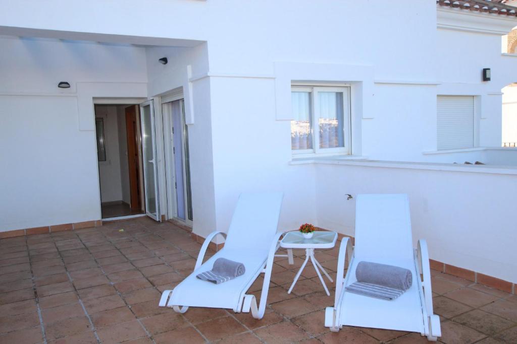 Balkón nebo terasa v ubytování Adosado Roldán by Rental Olé