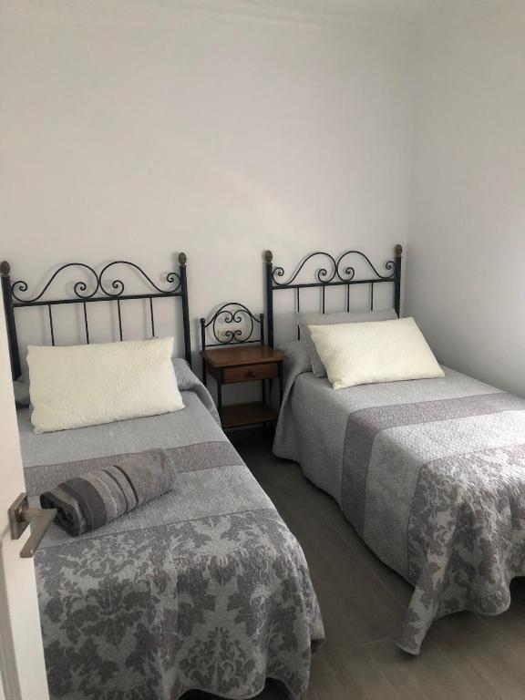Posteľ alebo postele v izbe v ubytovaní casa Encarni, balcon de las cuevas