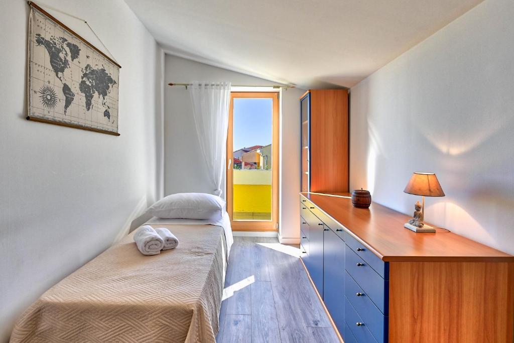 Postel nebo postele na pokoji v ubytování Villa Oscar, Zadar