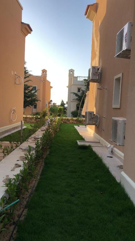 A garden outside Fancy sea view villa with private jacuzzi mountain view north coast Bait Karim - Twin Villa with roof & juccuzi