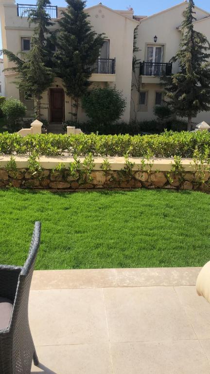 A garden outside Fancy sea view villa with private jacuzzi mountain view north coast Bait Karim - Twin Villa with roof & juccuzi