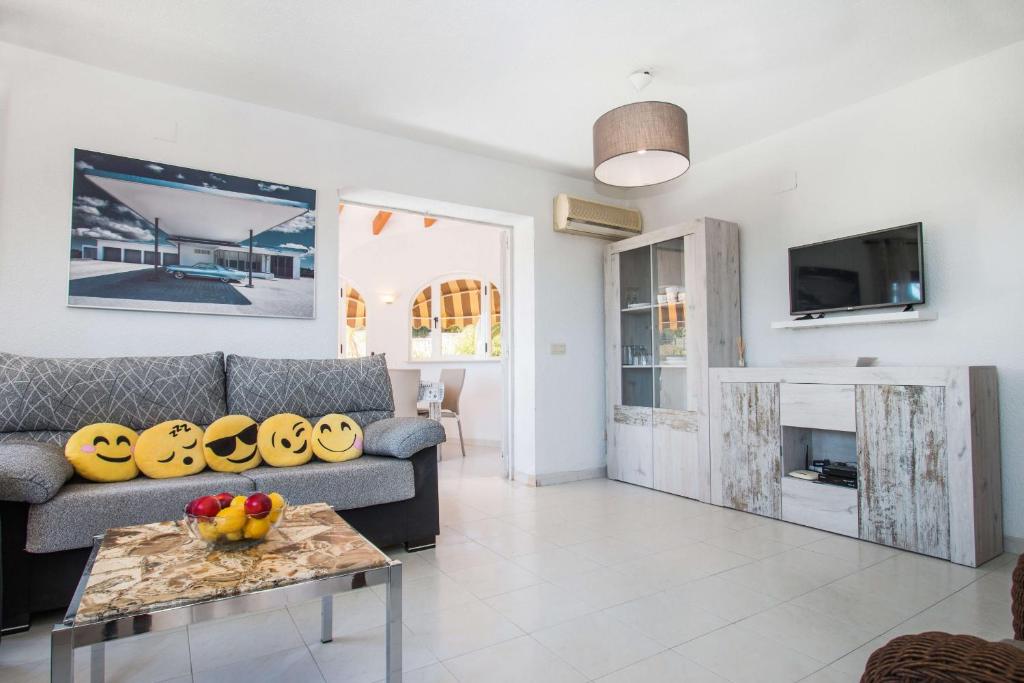A television and/or entertainment centre at Villa Erik - PlusHolidays