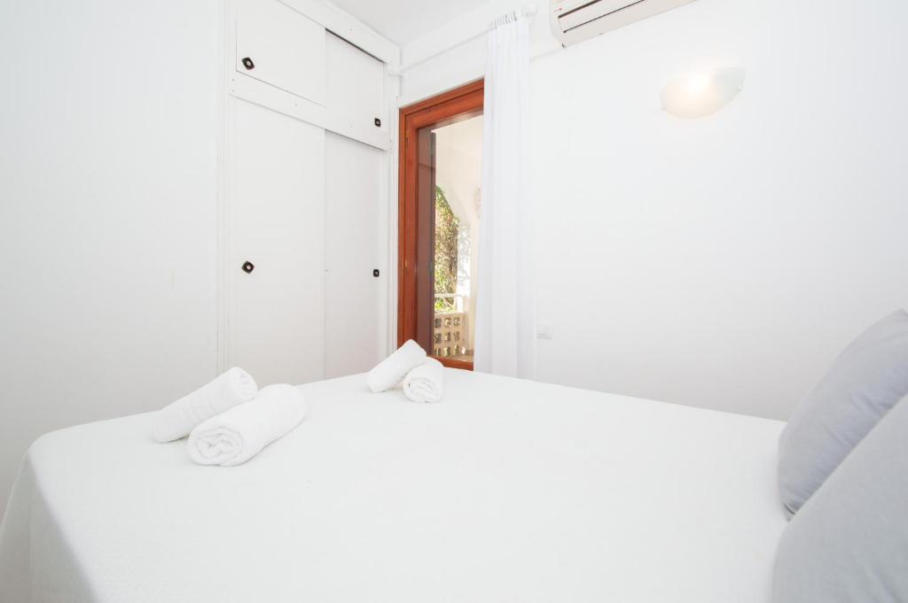Łóżko lub łóżka w pokoju w obiekcie Villa Felita by Sonne Villas