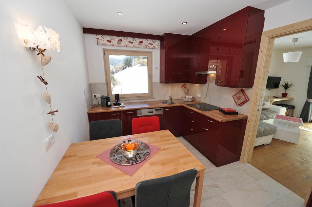 Kuchyň nebo kuchyňský kout v ubytování Apartments Cesa Leni