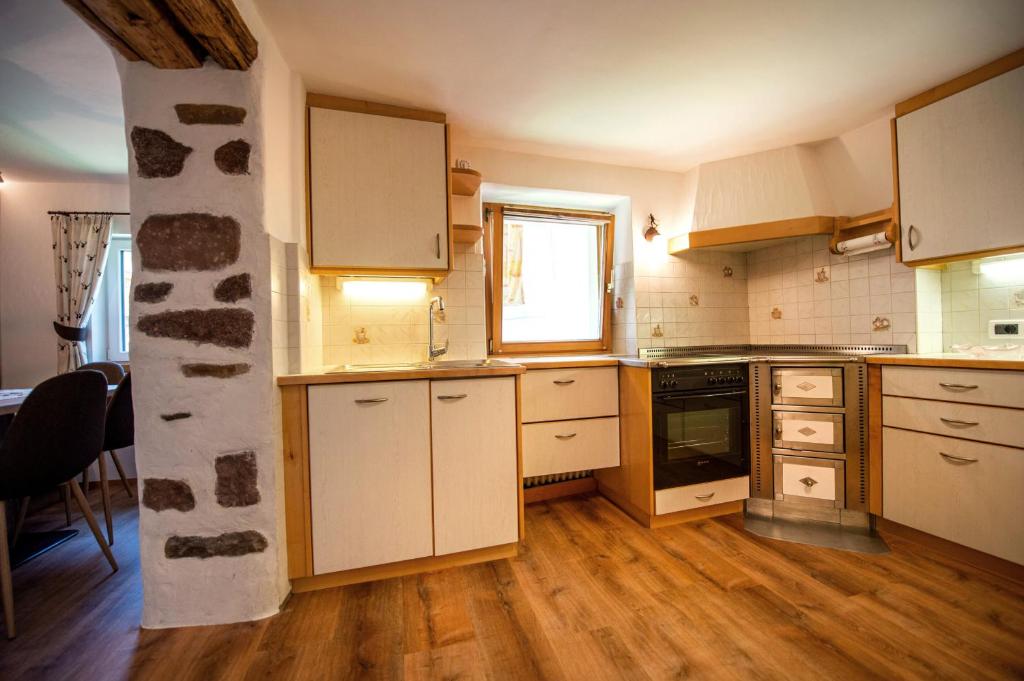 A kitchen or kitchenette at Apartments Smidl