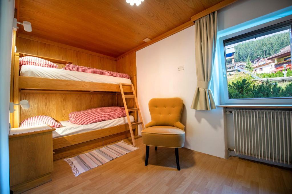 A bed or beds in a room at Apartments Smidl