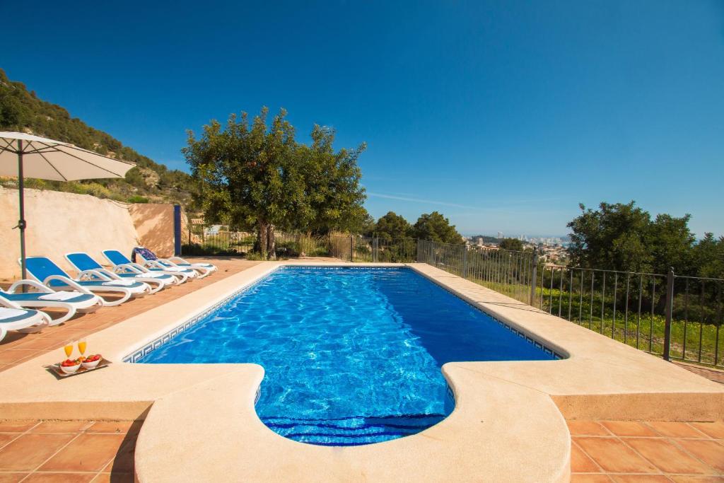 Bazén v ubytování Villa Bou - PlusHolidays nebo v jeho okolí