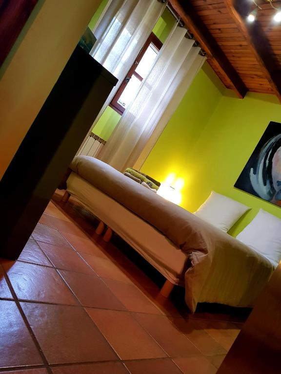 Postel nebo postele na pokoji v ubytování Om'Sleeping B&B
