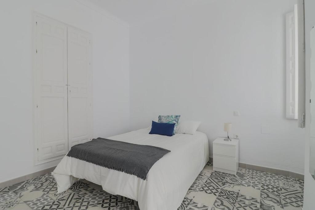 Posteľ alebo postele v izbe v ubytovaní C11 - Cosy 7 Bedrooms in Plaza Merced