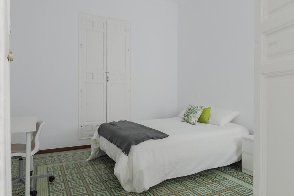 Posteľ alebo postele v izbe v ubytovaní C11 - Cosy 7 Bedrooms in Plaza Merced