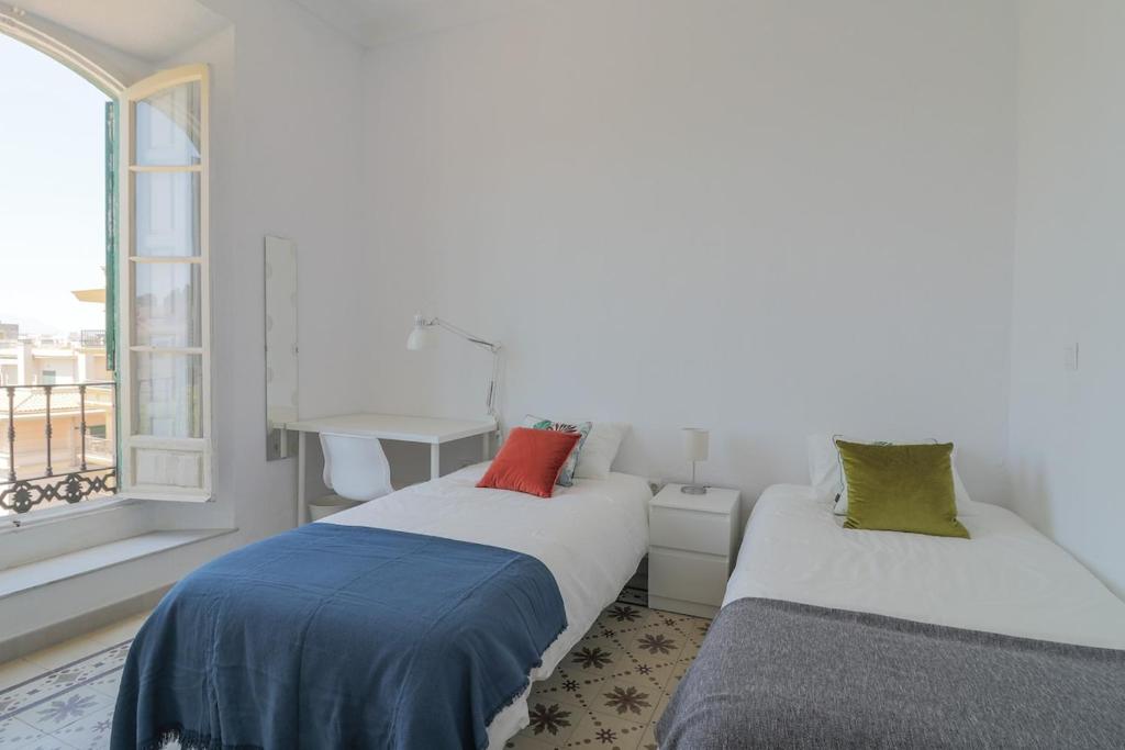 Posteľ alebo postele v izbe v ubytovaní C11 - Cosy 7 Bedrooms in Plaza Merced