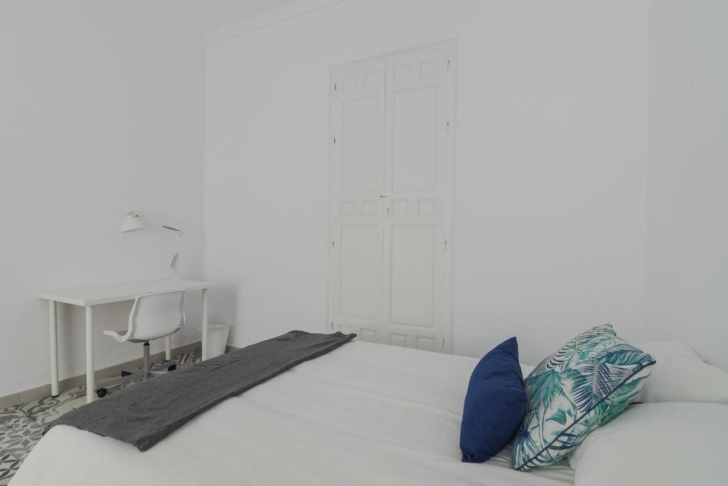 Posteľ alebo postele v izbe v ubytovaní C11 - Cosy 7 Bedrooms in Plaza Merced