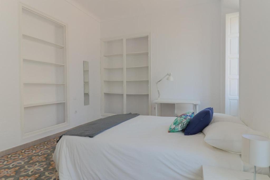 Posteľ alebo postele v izbe v ubytovaní C11 - Cosy 7 Bedrooms in Plaza Merced