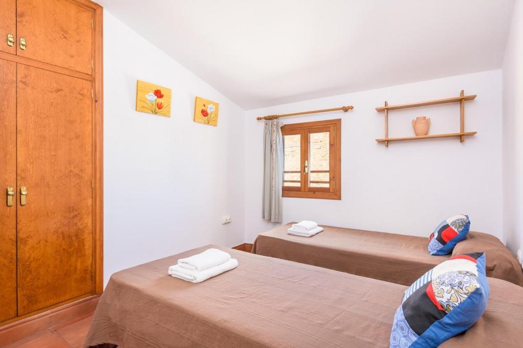 Postel nebo postele na pokoji v ubytování SA FONT 45