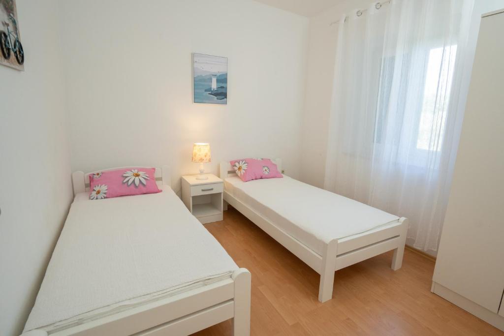 Postel nebo postele na pokoji v ubytování Kuća za odmor Denona