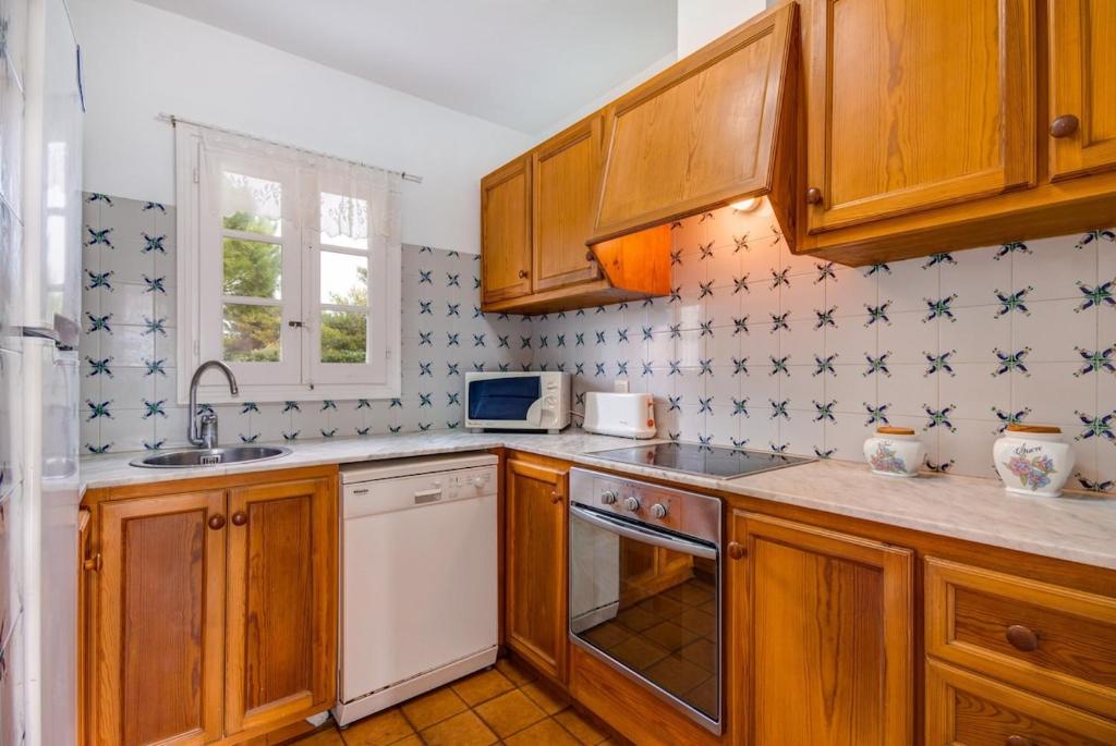 Kuchyň nebo kuchyňský kout v ubytování Villa Cristina