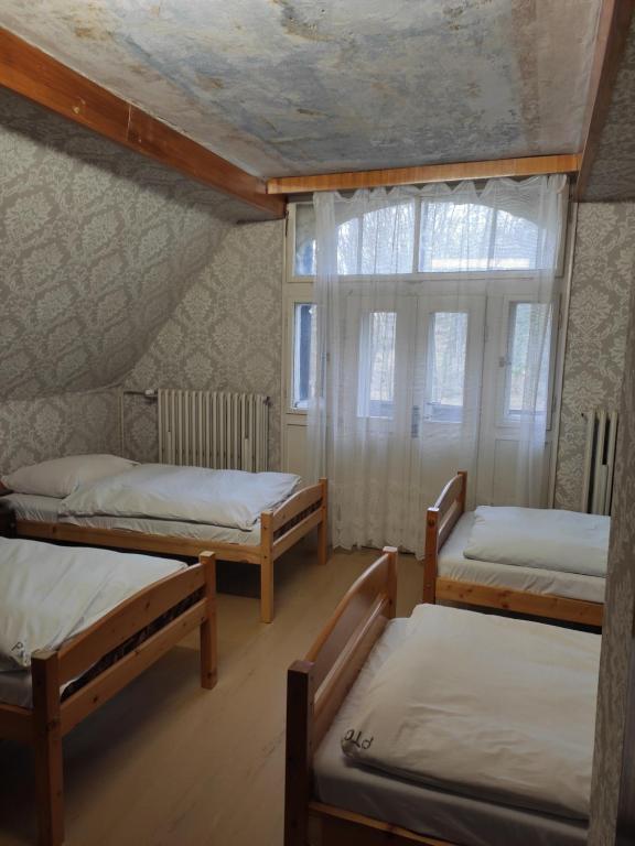 Posteľ alebo postele v izbe v ubytovaní středisko Doubrava