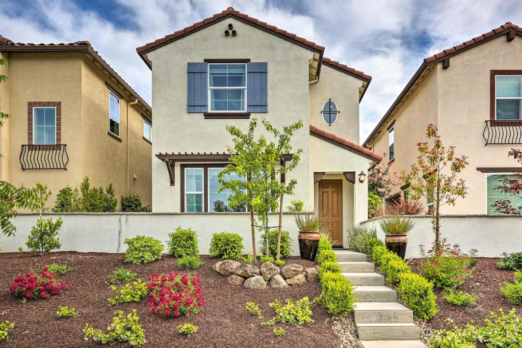 a house with a garden in front of it at Relaxing Roseville Home with Outdoor Amenities in Roseville