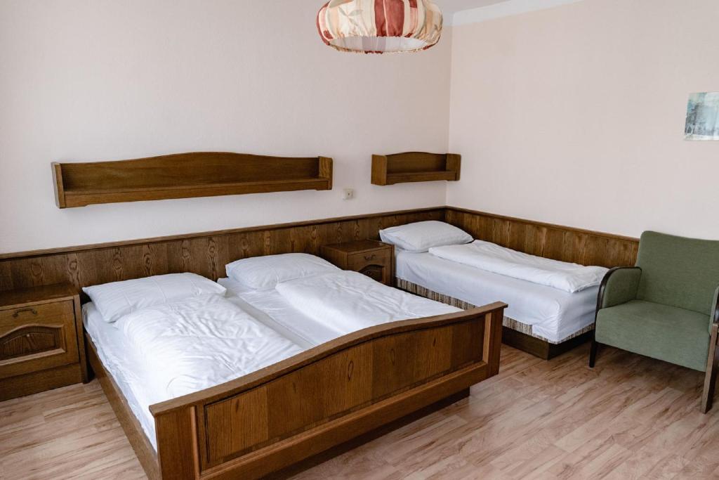 Ein Bett oder Betten in einem Zimmer der Unterkunft Gasthof Filzwieser