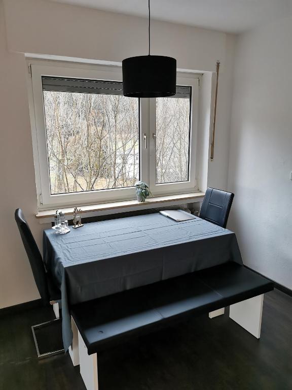 Postel nebo postele na pokoji v ubytování FeWo An der Elpe zwischen Winterberg und Fort Fun