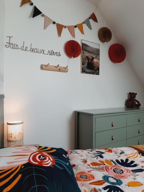 Posteľ alebo postele v izbe v ubytovaní Le Cottage du Bois Flotté