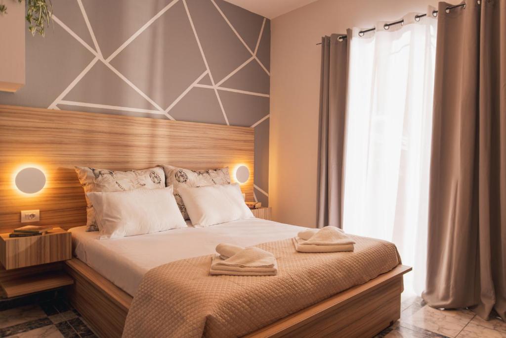 Postel nebo postele na pokoji v ubytování Asya Sea View Apartment