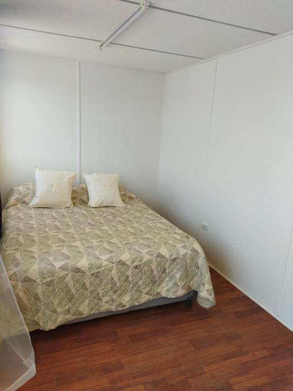 Postel nebo postele na pokoji v ubytování Container Home