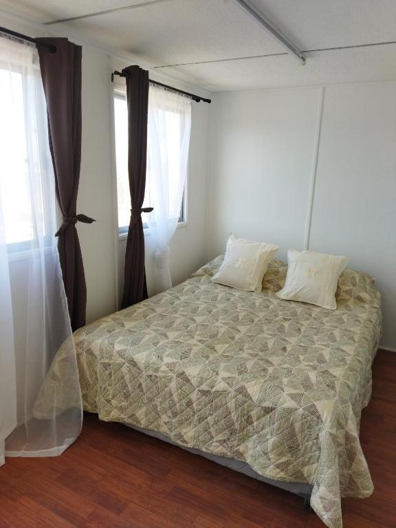 Postel nebo postele na pokoji v ubytování Container Home