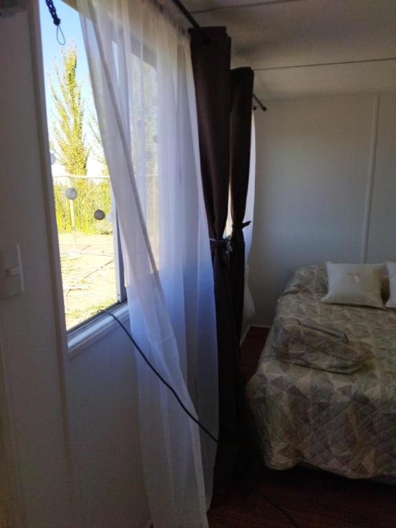 Postel nebo postele na pokoji v ubytování Container Home