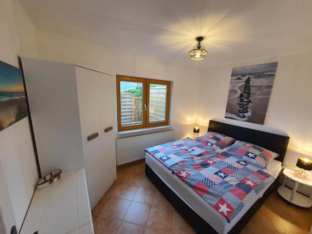 Postel nebo postele na pokoji v ubytování Ferienwohnung Örni