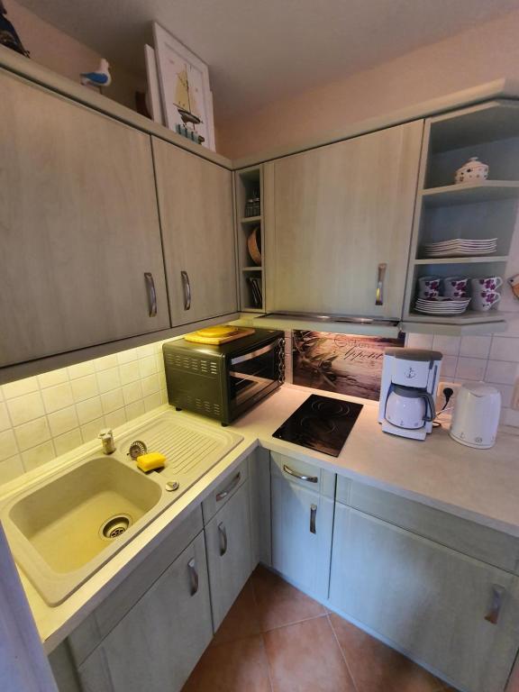 Kuchyň nebo kuchyňský kout v ubytování Ferienwohnung Örni