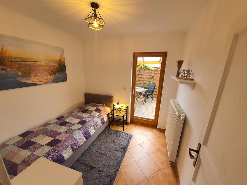 Postel nebo postele na pokoji v ubytování Ferienwohnung Örni