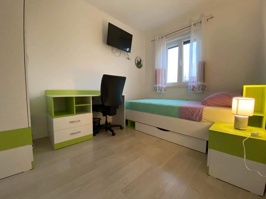 Posteľ alebo postele v izbe v ubytovaní Apartman Dominic