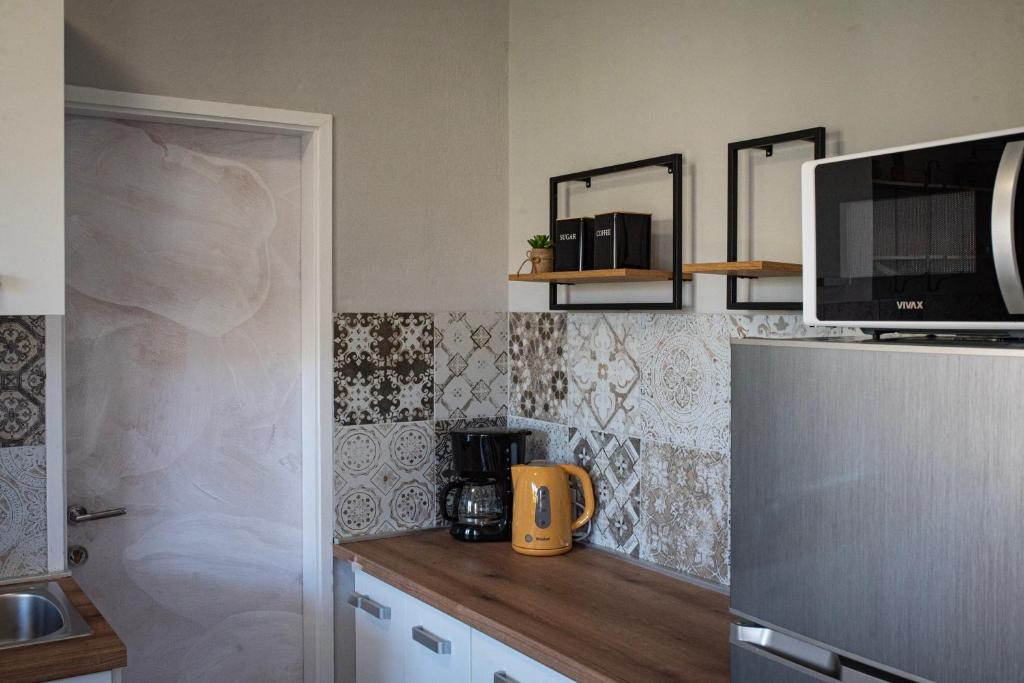Kuchnia lub aneks kuchenny w obiekcie Apartmani Nana Mija