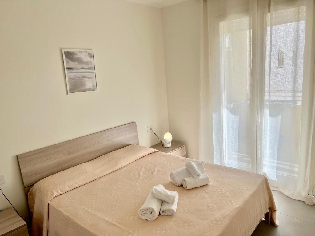 Posteľ alebo postele v izbe v ubytovaní Alghero CHARMING APARTMENTS DOWNTOWN