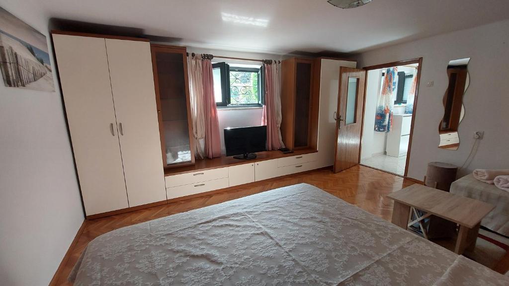 Telewizja i/lub zestaw kina domowego w obiekcie Opatija Centar