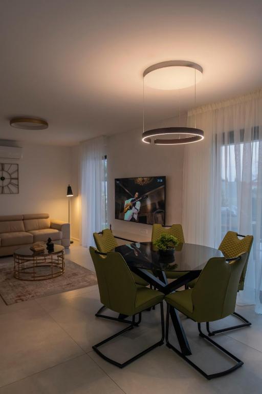 TV a/nebo společenská místnost v ubytování Villa Magna luxury apartments