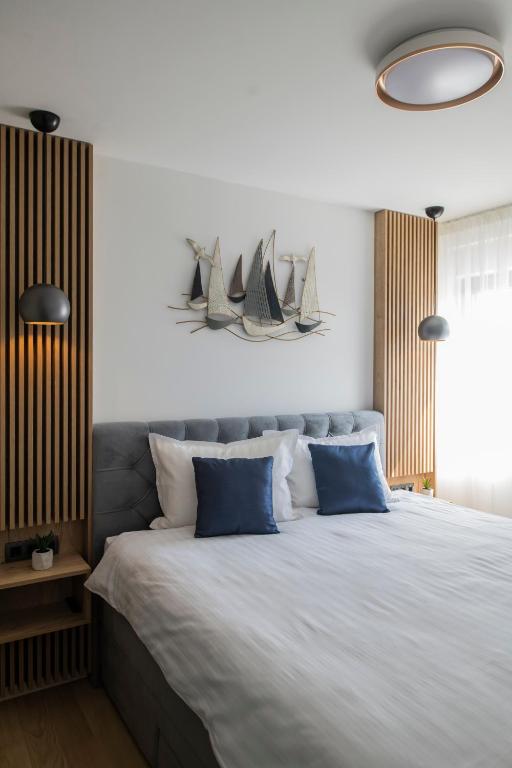 Postel nebo postele na pokoji v ubytování Villa Magna luxury apartments