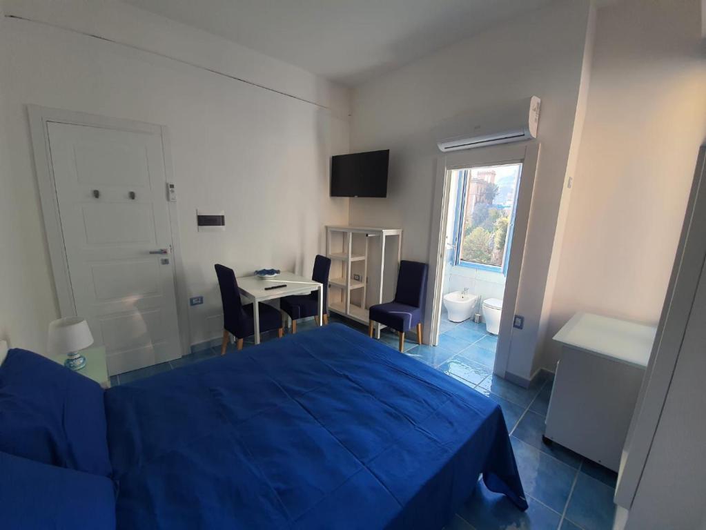 Posteľ alebo postele v izbe v ubytovaní B&B Acquamarine