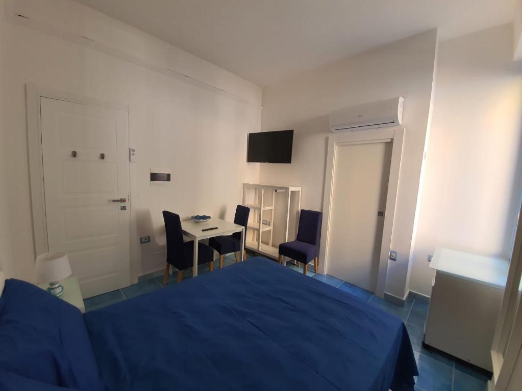 Posteľ alebo postele v izbe v ubytovaní B&B Acquamarine