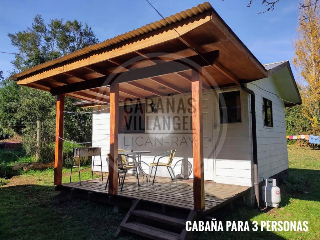 awning over a deck on a tiny house at Cabañas Villangel Licanray in Licán Ray