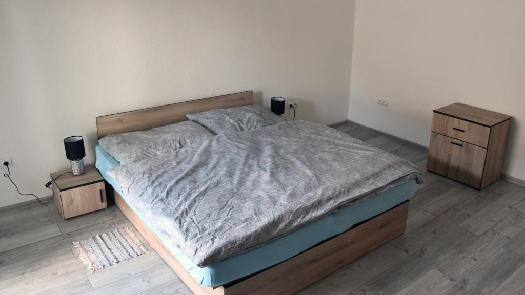 A bed or beds in a room at Apartmán u Braňa