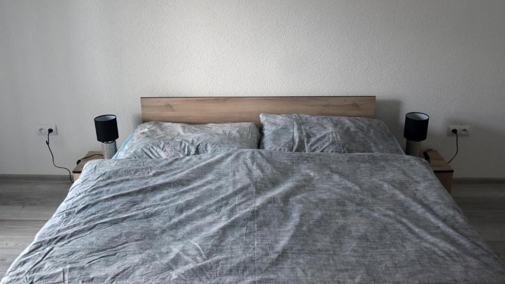 A bed or beds in a room at Apartmán u Braňa