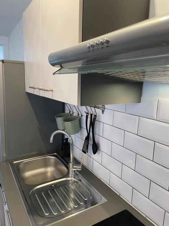 Kuchyňa alebo kuchynka v ubytovaní Apartman David 73