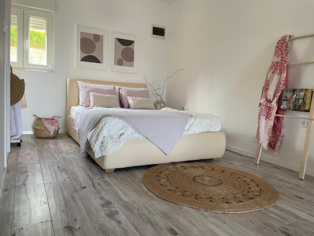 Posteľ alebo postele v izbe v ubytovaní Apartman David 73